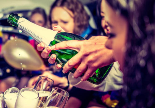 What Are the Additional Fees for Bringing Alcohol on a Party Bus?
